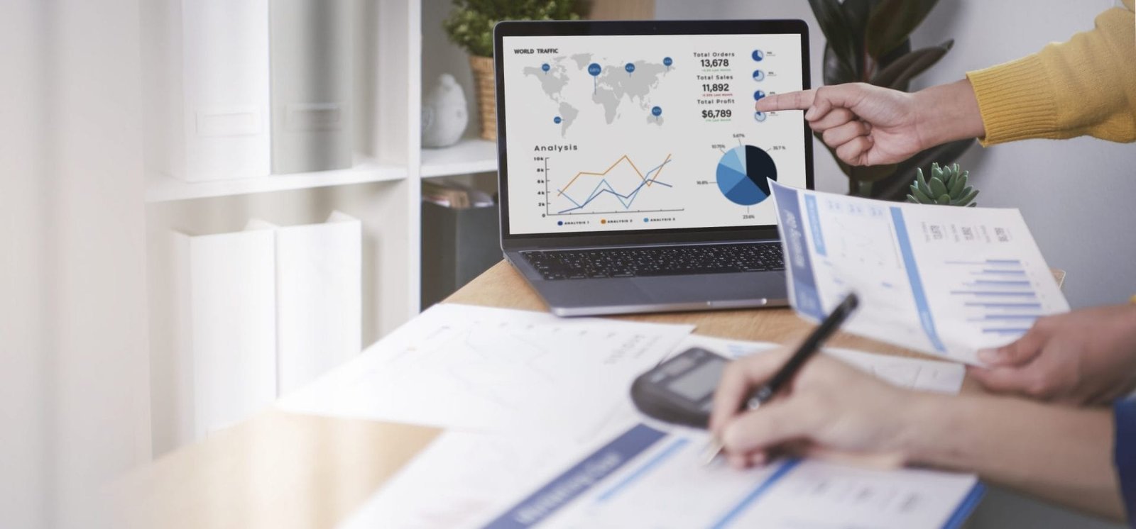 businesspeople-meeting-plan-analysis-graph-company-finance-strat-scaled-1